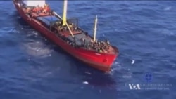 Huge Migrant Ship Docks In Greece as EU Asylum Policy Comes Under Fire
