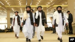 Delegasi Taliban Afghanistan saat bersiap menandatangani kesepakatan antara Taliban dan Amerika Serikat di Doha, Qatar, 29 Februari 2020.