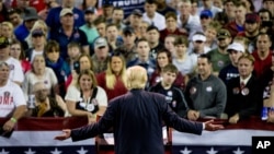 FILE - Republican presidential candidate Donald Trump speaks at a rally at Valdosta State University in Valdosta, Ga., Monday, Feb. 29, 2016.