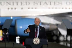 FILE - Vice President Mike Pence speaks to supporters, in Tallahassee, Fla., Oct. 24, 2020