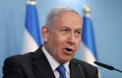 Israeli Prime Minister Benjamin Netanyahu announces full diplomatic ties will be established with the United Arab Emirates, during a news conference in Jerusalem, Aug. 13, 2020.