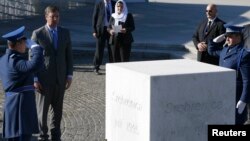 Serbia's Prime Minister Aleksandar Vucic (2nd L) attends an official ceremony at the Memorial Center Potocari, near Srebrenica, Bosnia and Herzegovina, Nov. 11, 2015.