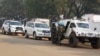 FILE - U.N. peacekeepers take a break as they patrol along a street during the presidential election in Bangui, the capital of Central African Republic, Dec. 30, 2015. 