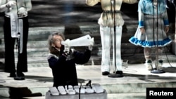 Terje Isungset preforms with ice instruments during the Nobel Banquet at the City Hal in Stockholm, Sweden, Dec. 10, 2017.
