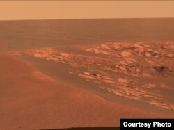 A view of the surface of Mars taken at the "Intrepid" crater by the Opportunity Mars Rover on November 11, 2010. (NASA/JPL-Caltech/Cornell University)
