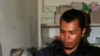 Arfian makes Coffee at his cafe after tsunami recovery program. Photo by Christoph Ernesti