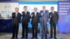 台湾法务部长蔡请祥（左三）、外交部政务次长田中光（左一）、法务部调查局长吕文忠（左二）、美国在台协会台北办事处副处长谷立言（右二）和日本台湾交流协会副代表横地晃（右一）10月28日在台北合影。（图片来源：台湾外交部网站）