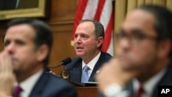 House Intelligence Committee Chairman Adam Schiff, D-Calif., questions former special counsel Robert Mueller, as he testifies before the House Intelligence Committee hearing on his report on Russian election interference, in Washington, July 24, 2019. 