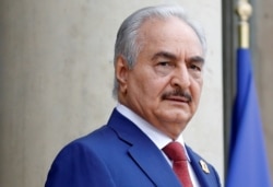 FILE - Khalifa Haftar, the military commander who dominates eastern Libya, arrives to attend an international conference on Libya at the Elysee Palace in Paris on May 29, 2018.