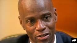 FILE - Haiti's President Jovenel Moise speaks during an interview at his home in Petion-Ville, a suburb of Port-au-Prince, Haiti. 