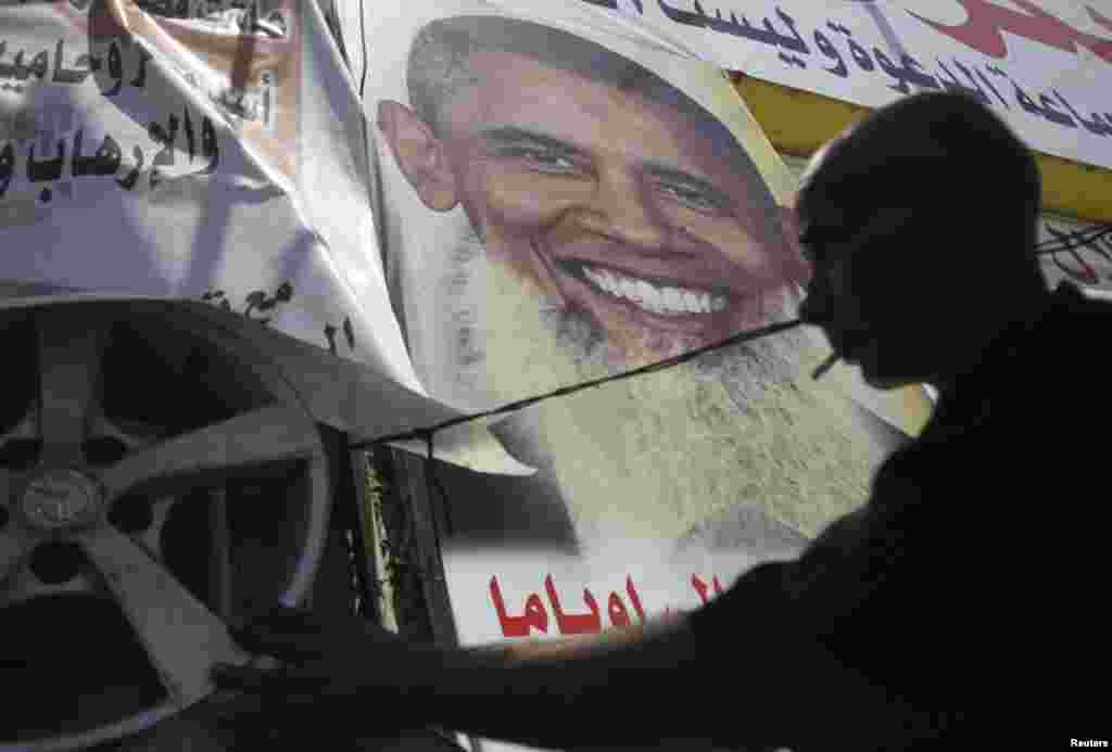 Qohirada AQSh prezidenti Barak Obamaning suratini ko'rasiz.