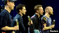 Coldplay singer Chris Martin speaks during the Super Bowl 50 Halftime Show press conference at Moscone Center, San Francisco, California, Feb. 4, 2016. (Credit: Michael Madrid-USA TODAY Sports)
