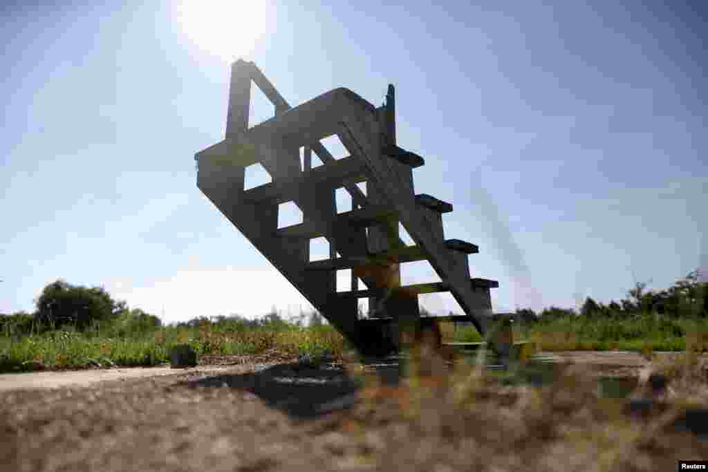 Stairs are all that remain of a house that once stood before Hurricane Katrina struck 10 years ago, Waveland, Mississippi.