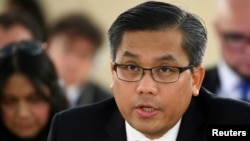 FILE - Myanmar's U.N. Ambassador Kyaw Moe Tun addresses the U.N. Human Rights Council in Geneva, Switzerland, March 11, 2019. 