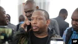 Nairobi governor Mike Gideon Mbuvi appears with other suspects accused of corruption, at the Mililani law court in Nairobi, Kenya, Dec. 9, 2019. 