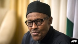 FILE - Nigerian President Muhammadu Buhari gives an interview to AFP at his hotel during the 25th African Summit in Johannesburg, June 14, 2015. 