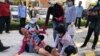Three Charged with Incitement for Peace Accords Protest at Chinese Embassy 