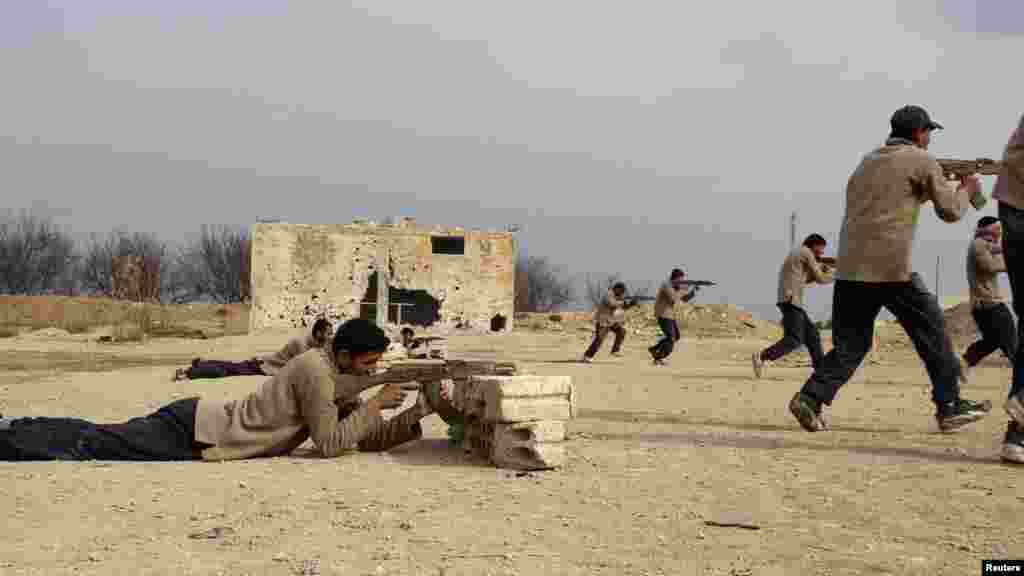 New recruits attend military training to be part of the Free Syrian Army in eastern al-Ghouta, near Damascus, Feb. 16, 2014.