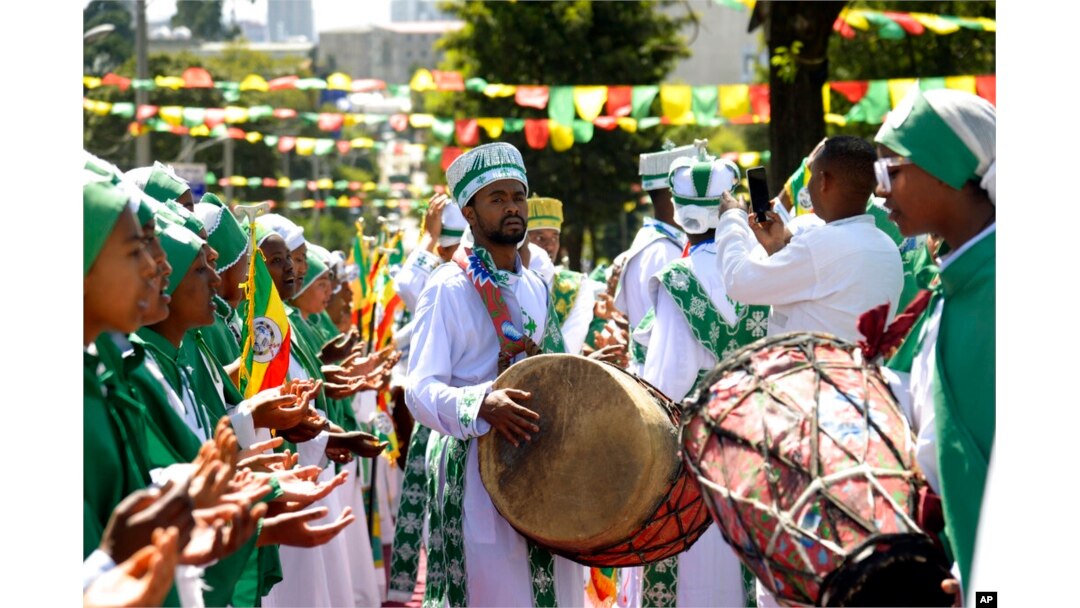 People celebrate Epiphany, a colorful festival celebrated all over Ethiopia to commemorate the baptism of Jesus Christ by John the Baptist in the River Jordan, in Addis Ababa, Ethiopia, Jan. 18, 2023.