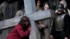 FILE - Rochus Rueckel as Jesus performs with cast members during the rehearsal of the 42nd Passion Play in Oberammergau, Germany, May 4, 2022