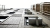 FILE - Window air conditioners are pictured in New York. The U.S. Senate on Sept. 21, 2022, ratified a pact that compels countries to limit use of hydrofluorocarbons – greenhouse gases used in refrigeration and air conditioning that are far more powerful than carbon dioxide. 