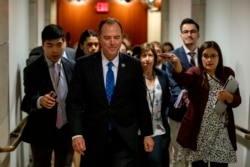 FILE - House Intelligence Committee Chairman Rep. Adam Schiff of Calif., leaving a secure area where Deputy Assistant Secretary of Defense Laura Cooper was testifying, Oct. 23, 2019, on Capitol Hill.