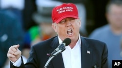 FILE - In this Feb. 28, 2016, photo, Republican presidential candidate Donald Trump speaks during a rally in Madison, Alabama. Trump has staked out uncompromising positions on Asia policy experts believe would strain U.S. relations with the region.
