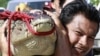 Floods Force Thais to Track Down Crocodiles in Bangkok Neighborhoods