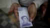 “Es como si no tuvieras tu dinero”: banco en Venezuela restringe fondos a sus clientes 