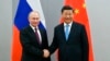 俄罗斯总统弗拉基米尔·普京与中国国家主席习近平握手