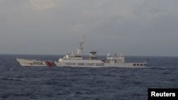 China Coast Guard vessel No. 31239 sails in the East China Sea near the disputed isles known as Senkaku isles in Japan and Diaoyu islands in China, in this handout photo taken and released by the 11th Regional Coast Guard Headquarters-Japan Coast Guard December 22, 2015. 