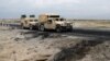 Konvoi kendaraan militer Afghanistan dekat pangkalan udara Bagram, di Afghanistan, 9 April 2019. (Foto: Reuters)