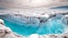 In 2012 polar ice sheets melted at an accelerating rate. In this photo surface melt water rushes along the surface of the Greenland Ice Sheet through a supra-glacial stream channel. (Ian Joughin)