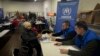 FILE - Employees of the U.N. Refugee Agency register refugees from the Donetsk region, the site of heavy battles with the Russian troops, in Pavlohrad, Dnipropetrovsk region, Ukraine, Dec. 12, 2024. 