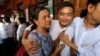 A student protester (C) and his family member cry after he was released by the new government's general amnesty at Tharrawaddy court, Tharrawaddy, Bago division, April 8, 2016. 