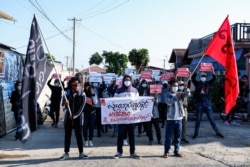 Protesters take part in a demonstration against the military coup during "Global Myanmar Spring Revolution Day" in Taunggyi, Shan state, May 2, 2021.