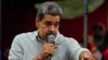 ARCHIVO - El presidente de Venezuela, Nicolás Maduro, se dirige a leales al gobierno reunidos en el palacio presidencial en apoyo de su reelección un mes después de la votación presidencial, en Caracas, Venezuela, el miércoles 28 de agosto de 2024. 