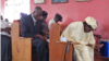 People are seen praying at St. Paul's Congregational Evangelical Church, Freetown, Sierra Leone, April 26, 2015. (N. deVries/VOA)