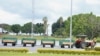 A tractor pulls special airport carts transporting the coffins of the victims of the March 10 Ethiopian Airlines Flight 302 crash from the terminal at the Jomo Kenyatta International Airport in Nairobi, Kenya, Oct. 14, 2019.