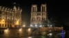 Katedral Notre Dame diterangi lampu-lampu di Paris, 16 Desember 2019. 
