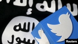 Logo Twitter dan bendera kelompok militan Negara Islam (SISI).