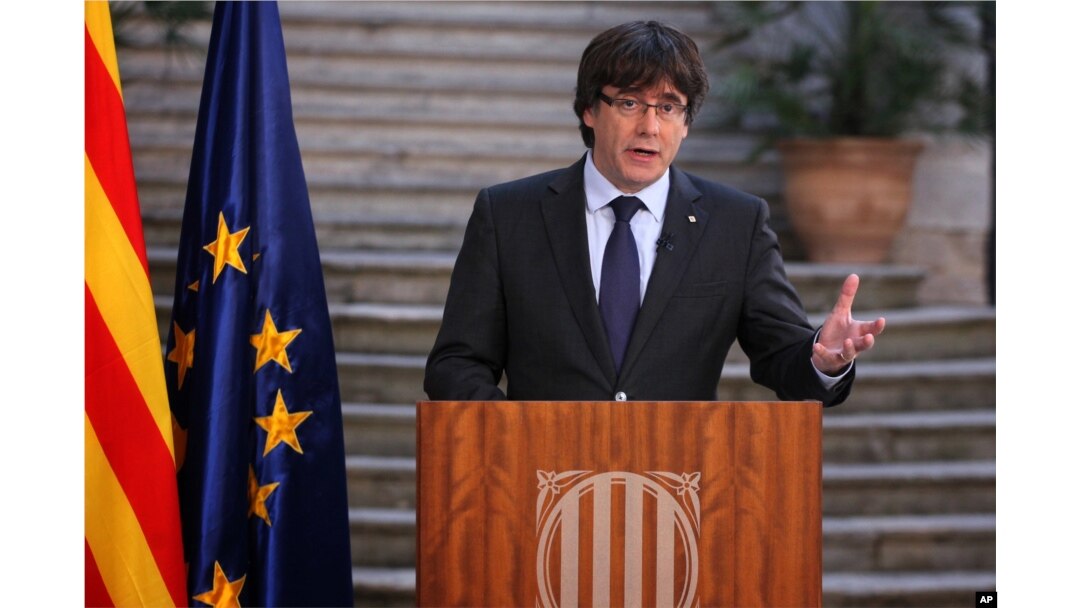 Catalan President Carles Puigdemont speaks during a statement at the Palau Generalitat in Barcelona, Spain, on Saturday, Oct. 28, 2017.