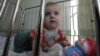 US Hopeful Pending Russian Adoptions Can Continue
