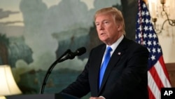 FILE - President Donald Trump speaks at the White House in Washington, Oct. 13, 2017. 