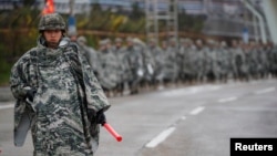 South Korean marines march during a military exercise as a part of the annual joint military training called Foal Eagle between South Korea and the U.S. in Pohang, South Korea, April 5, 2018. 