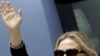 US Secretary of State, Hillary Rodham Clinton waves upon arrival in Kolkata, India, Sunday, May 6, 2012. 