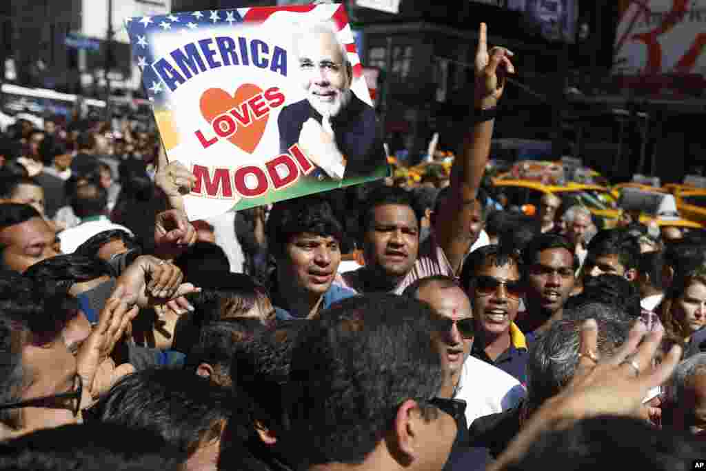 Supporters of Prime Minister Narendra Modi of India crowd the streets after Modi gave a speech during a reception by the Indian community in honor of his visit to the United States, Madison Square Garden, New York, Sept. 28, 2014.