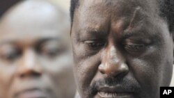 African Union envoy and Kenyan Prime Minister Raila Odinga gives a press conference at the Felix Houphouet Boigny airport in Abidjan before leaving Ivory Coast, 19 Jan 2011
