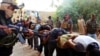 ISIL Militants’ Photos of Iraqi Executions Expand Warfare