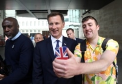 Jeremy Hunt, a leadership candidate for Britain's Conservative Party, leaves BBC studios in London, June 30, 2019. (Reuters)
